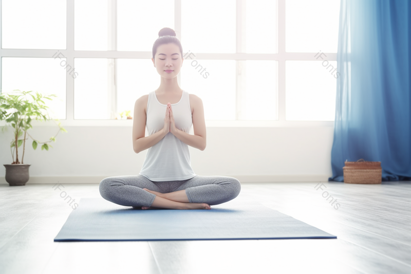 女性瑜伽瘦身室内场景盘腿坐在瑜伽垫上冥想锻炼图像摄影,高清,摄影图,摄影图片,图片大全,摄影图免费下载